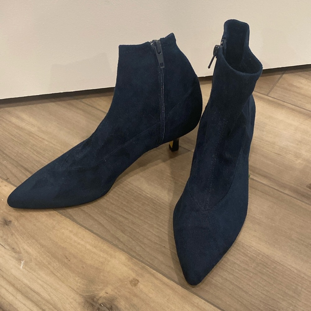 Suede ankle booties in navy.